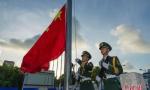 中国在南海9个岛礁同时升起五星红旗(图) 